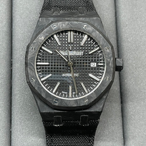 Audemars Piguet black sports watch with textured dial and date window