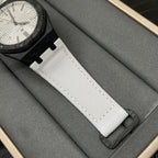 Audemars Piguet Royal Oak watch on a white fabric strap with black deployant clasp