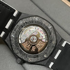 Audemars Piguet Royal Oak watch skeleton caseback with visible gears and jeweled movement