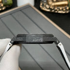 Audemars Piguet Royal Oak watch case close-up with black octagonal bezel and top crown