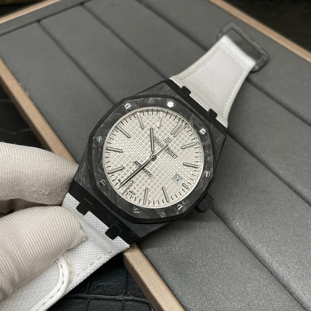 Audemars Piguet Royal Oak watch with white dial, black case, and white fabric strap