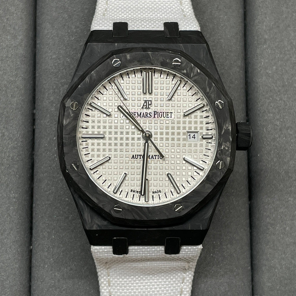 Audemars Piguet Royal Oak watch with black octagonal case, white dial, and white strap