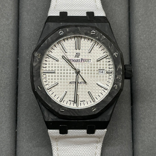Audemars Piguet Royal Oak watch with black octagonal case, white dial, and white strap