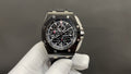 Audemars Piguet wristwatch with black chronograph dial, steel case, steel bracelet