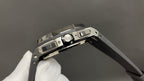Audemars Piguet wristwatch top view with crown and buttons, black strap