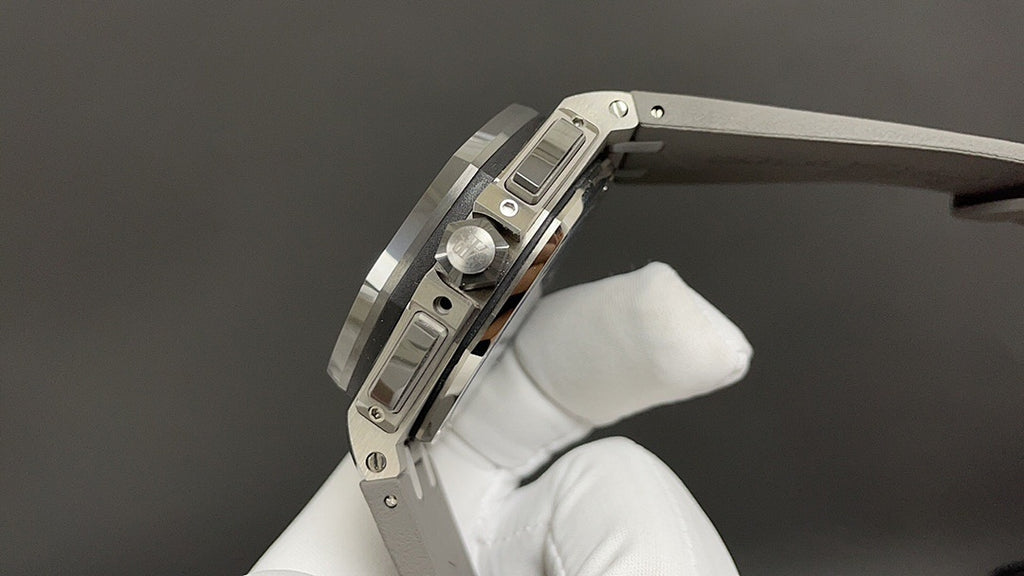 Stainless steel watch side with crown and pushers, shown with clasp and link