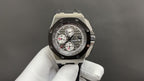 Audemars Piguet Royal Oak steel chronograph watch with black dial and rubber strap