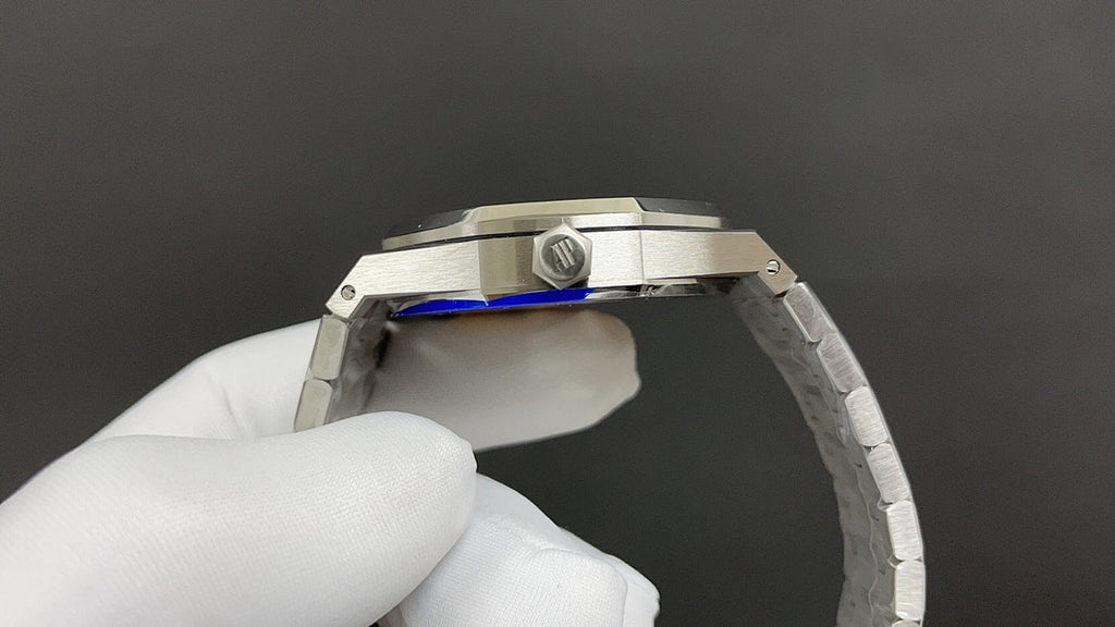 Audemars Piguet watch case back edge in steel, with crown detail and strap link