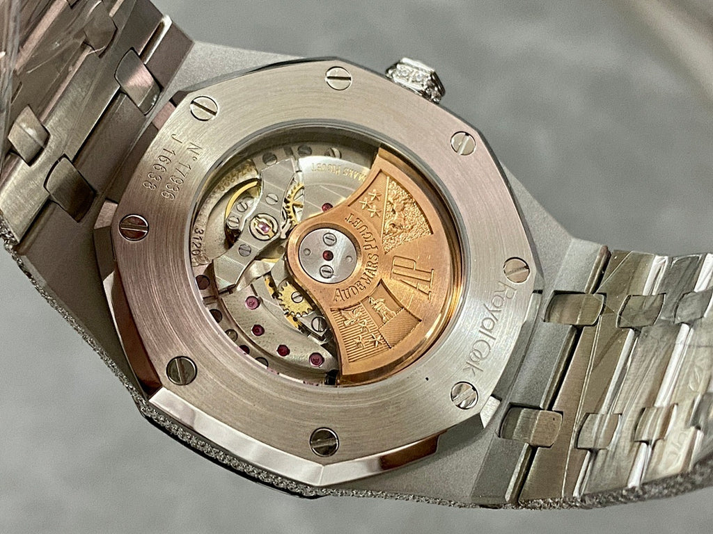 Luxury watch case back with exposed mechanical movement and diamond-set bezel