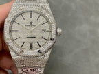Close-up of silver-toned diamond-studded watch dial with baton markers and crown