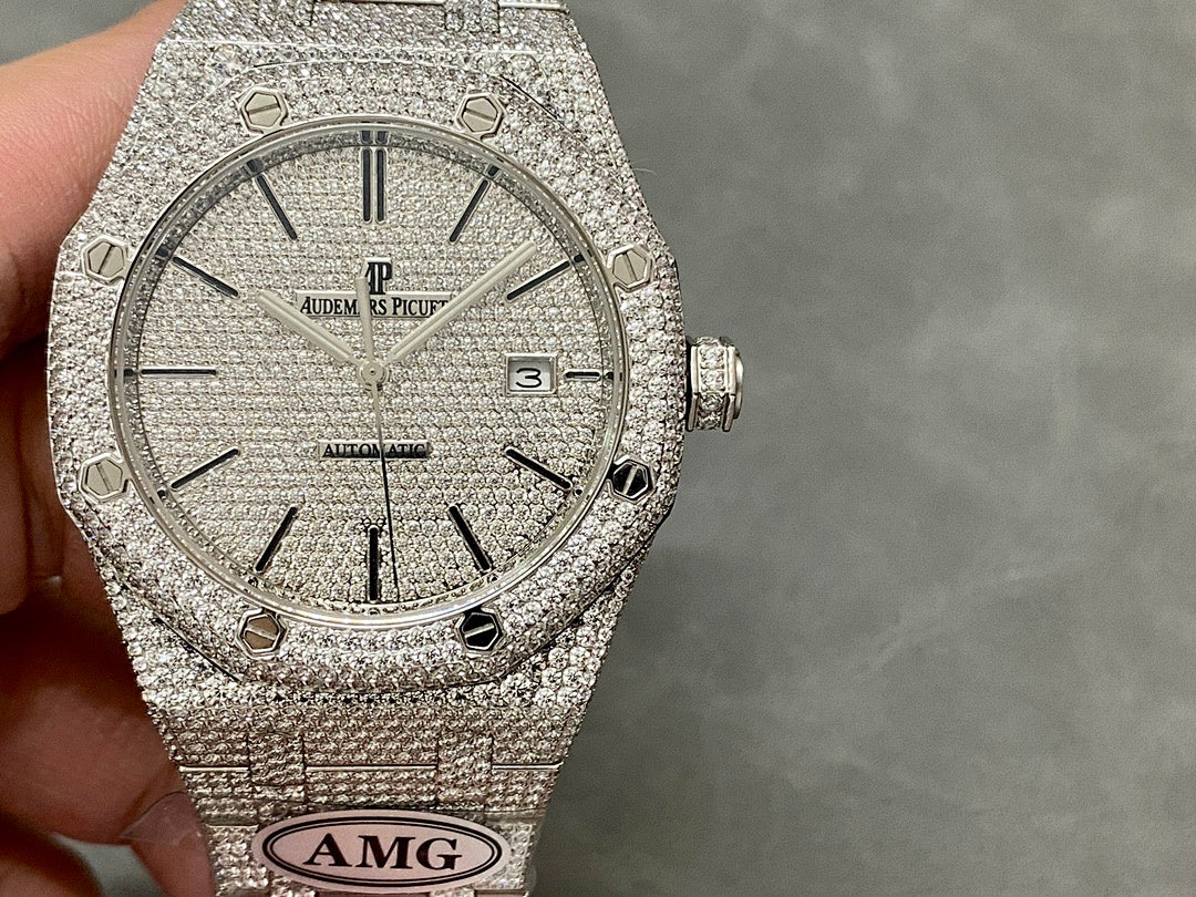 Close-up of silver-toned diamond-studded watch dial with baton markers and crown