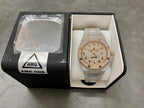 Diamond wristwatch in open box with champagne dial and metal bracelet