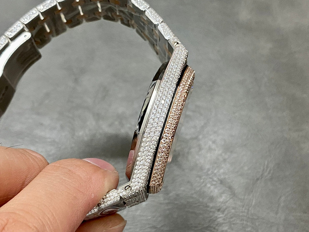 Wristwatch bracelet side view with diamond frame and gold-toned inner track