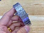 Audemars Piguet stainless steel bracelet links with blue-toned accents