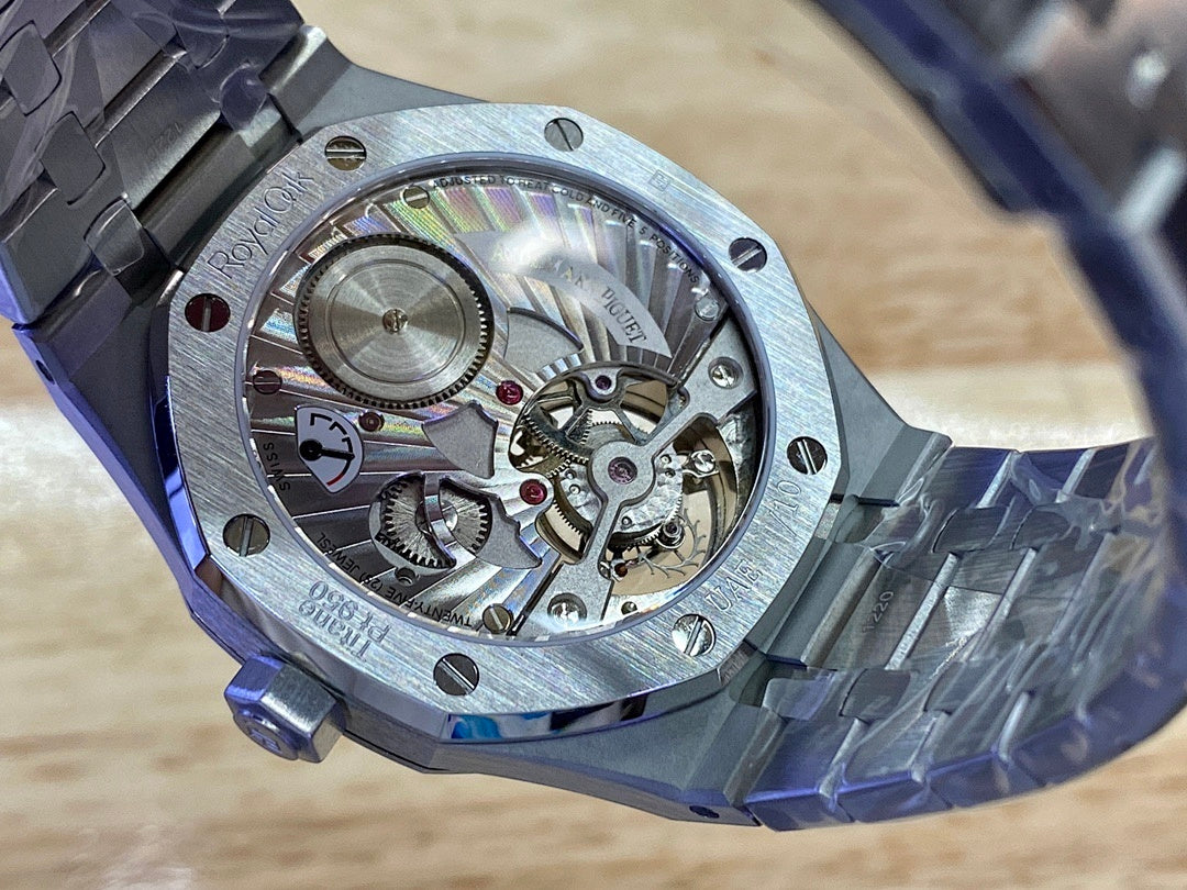 Audemars Piguet watch caseback with visible gears and balance wheel