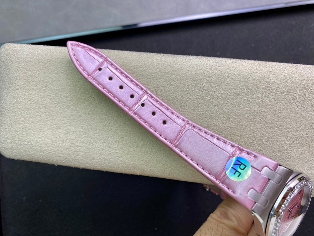 Pink leather watch strap with perforations and metal buckle