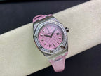 Pink dial wristwatch with diamond bezel and pink leather strap on cushion