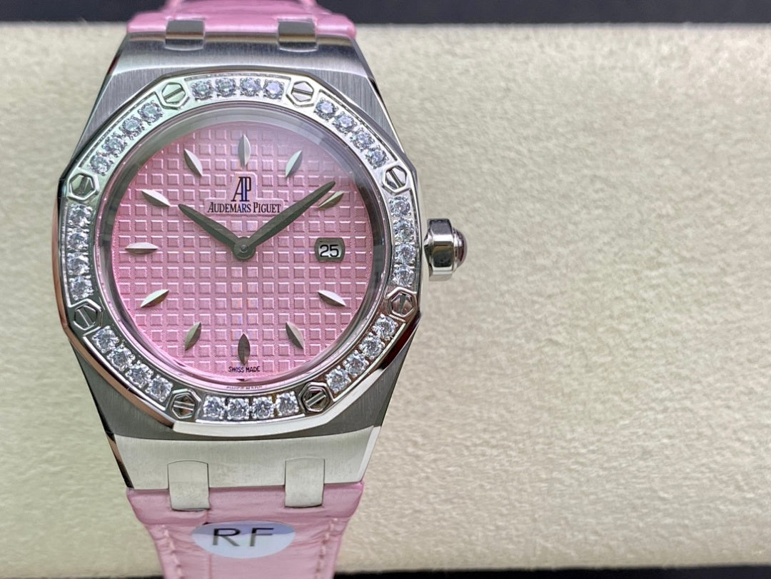 Pink dial diamond bezel wristwatch with pink strap and steel crown detail