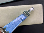 Audemars Piguet watch strap close-up with light blue leather and brushed metal clasp