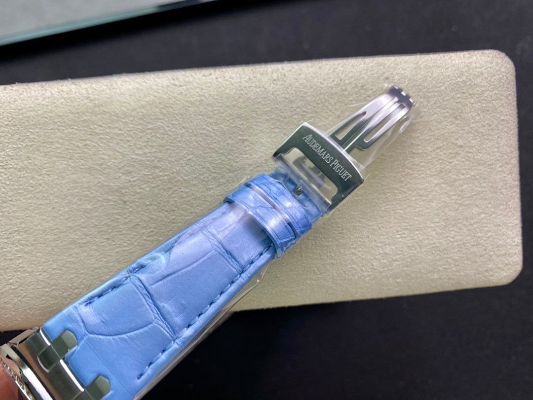 Audemars Piguet watch strap close-up with light blue leather and brushed metal clasp