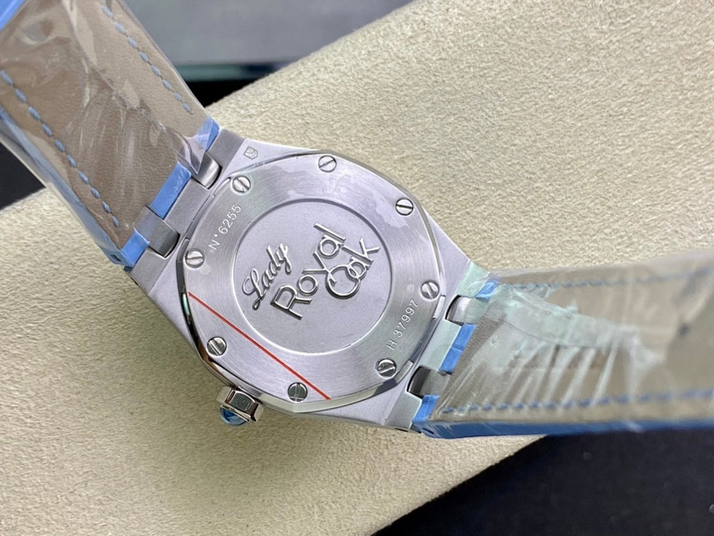Audemars Piguet watch caseback in stainless steel on light blue leather strap