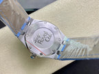 Audemars Piguet watch caseback in stainless steel on light blue leather strap