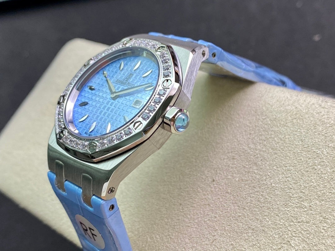 Audemars Piguet wristwatch with blue dial, diamond bezel, blue leather strap