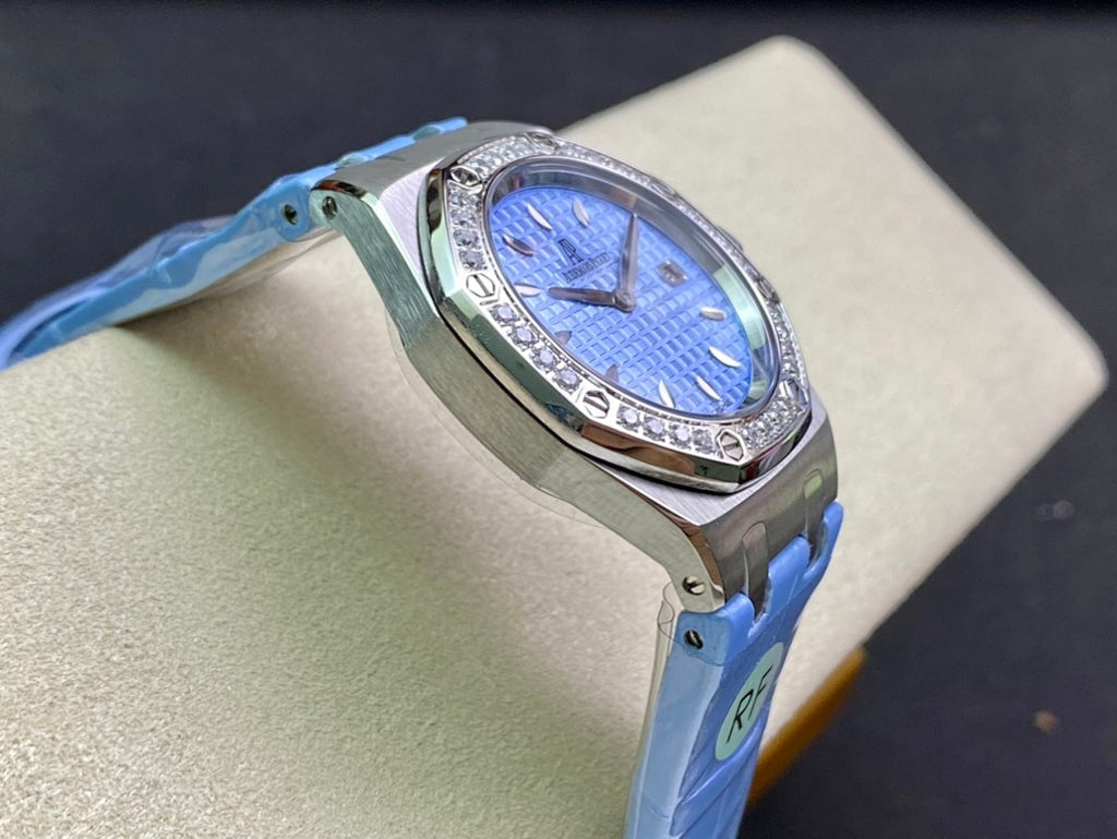 Audemars Piguet wristwatch angled view with blue dial, diamond bezel, blue leather strap