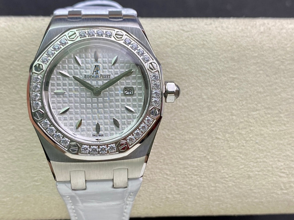 Audemars Piguet wristwatch on white leather strap, silver case, diamond bezel, white dial
