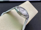 Audemars Piguet wristwatch back view with silver case and white leather strap