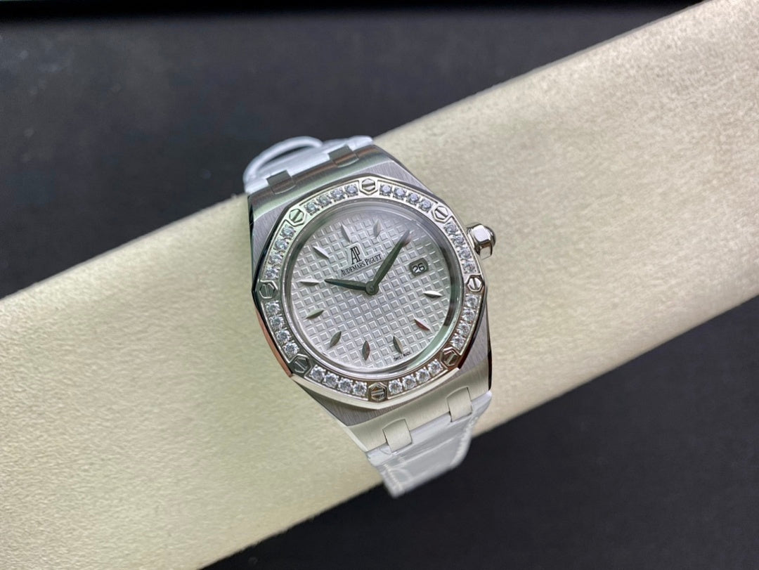 Audemars Piguet wristwatch angled view with silver case, diamond bezel, white dial, strap
