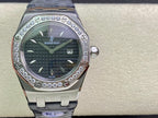Audemars Piguet watch on display with silver case, dark dial, diamond bezel, blue strap