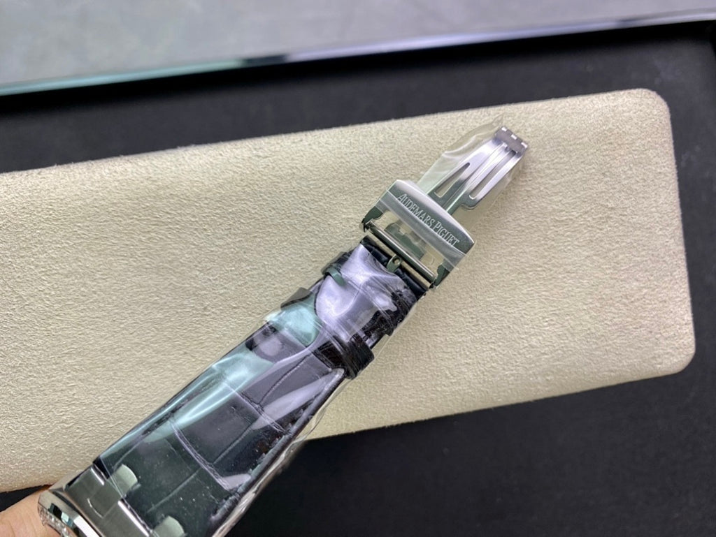 Audemars Piguet watch strap buckle and clasp with metal hardware and blue patterned leather