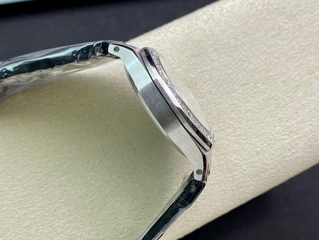 Audemars Piguet watch side profile with silver case and diamond-set bezel