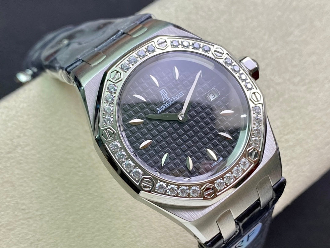 Audemars Piguet watch close-up with dark green textured dial and diamond bezel on blue strap