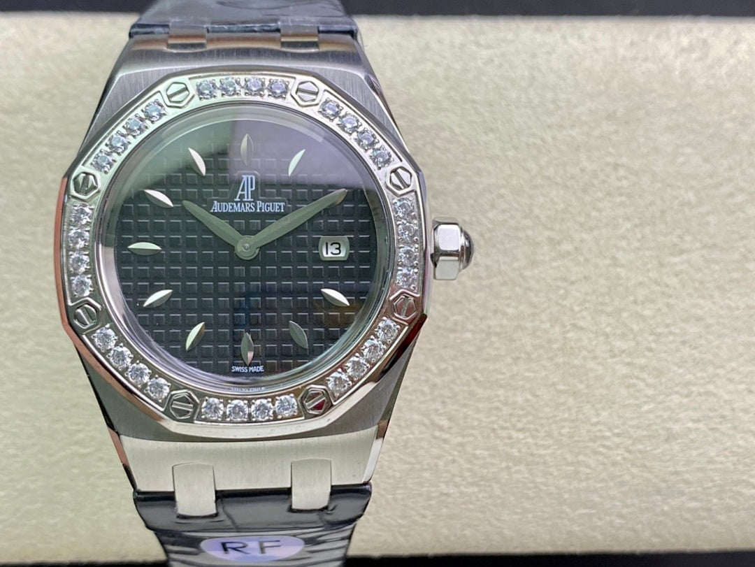 Audemars Piguet watch front view with silver case, dark dial, diamond bezel, blue strap