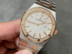Audemars Piguet watch with diamond bezel, white dial, and steel-and-gold link bracelet