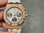 Audemars Piguet chronograph watch, rose-gold bezel with diamonds, white rubber strap