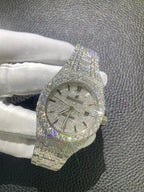 Audemars Piguet diamond-set watch with silver dial, three-quarter view on glove