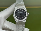 Silver-tone steel watch with black dial and linked bracelet, front view