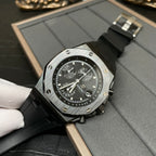 Audemars Piguet Royal Oak chronograph watch with black dial and black rubber strap