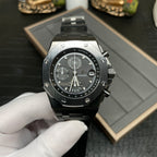 Audemars Piguet Royal Oak chronograph watch with black dial and black rubber strap