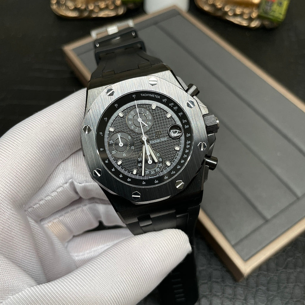 Audemars Piguet Royal Oak chronograph watch with black dial, three subdials and black strap