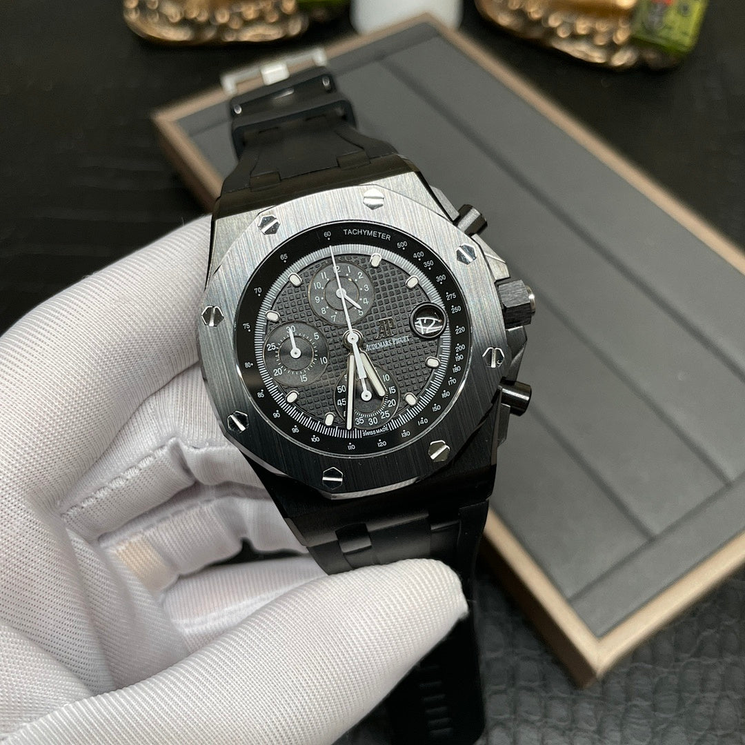 Audemars Piguet Royal Oak chronograph watch with black dial, three subdials and black strap