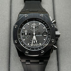 Audemars Piguet Royal Oak chronograph watch with black dial and black rubber strap