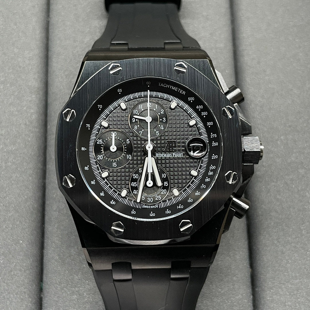 Audemars Piguet Royal Oak chronograph watch with black dial and black rubber strap