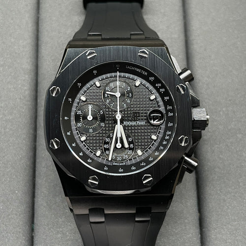 Audemars Piguet Royal Oak chronograph watch with black dial and black rubber strap