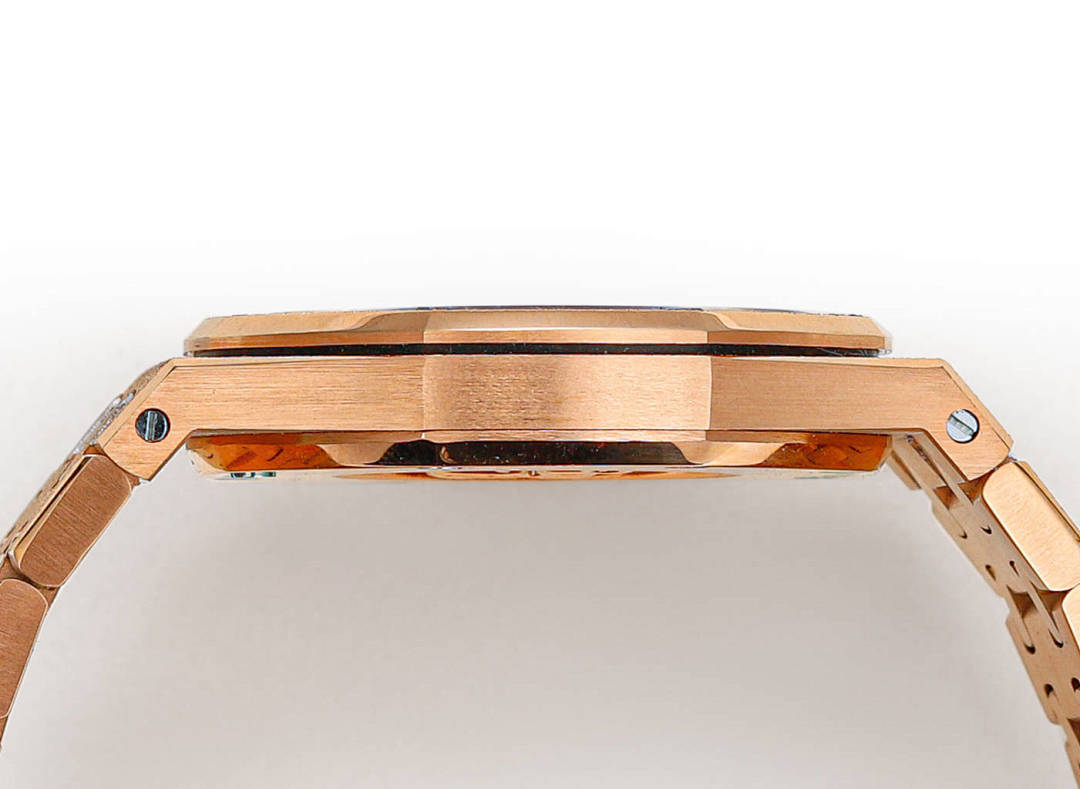 Audemars Piguet rose gold watch case with open underside detail and crown posts.