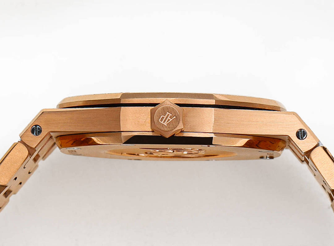 Audemars Piguet rose gold watch underside with engraved cap and metal case details.