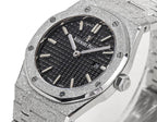Audemars Piguet stainless steel watch face with dark dial, baton hands, and date at 28